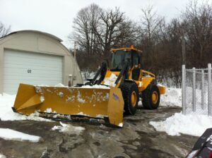 CAT loader with protech snow pusher